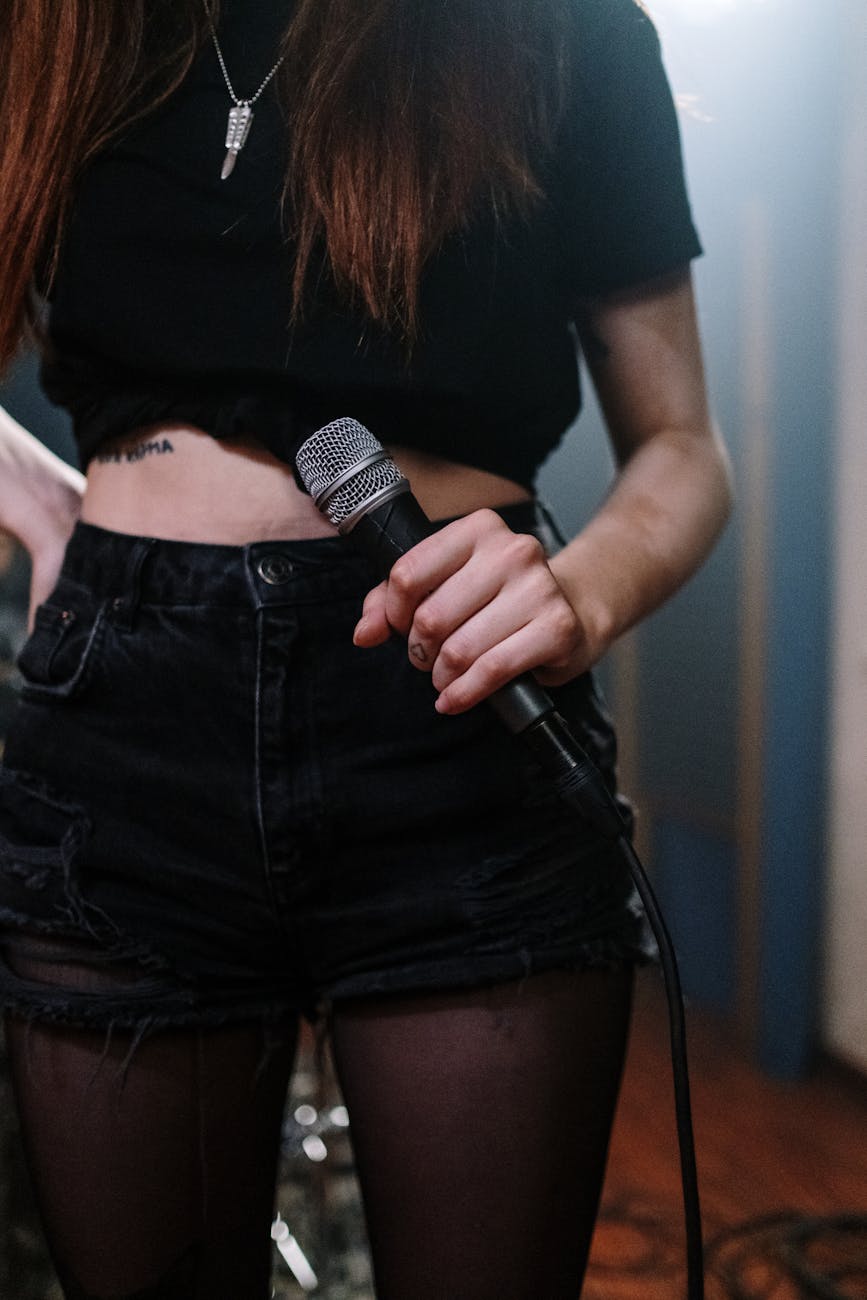 singer holding microphone